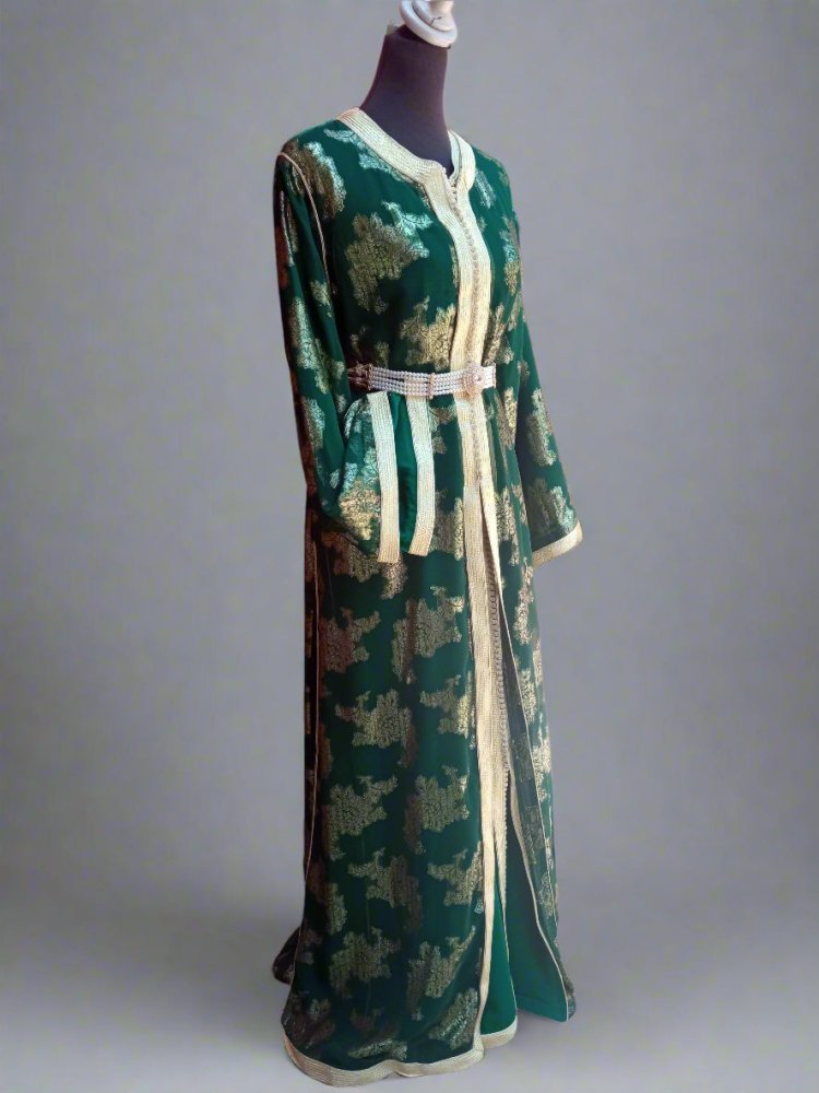 Green and gold dress on a mannequin