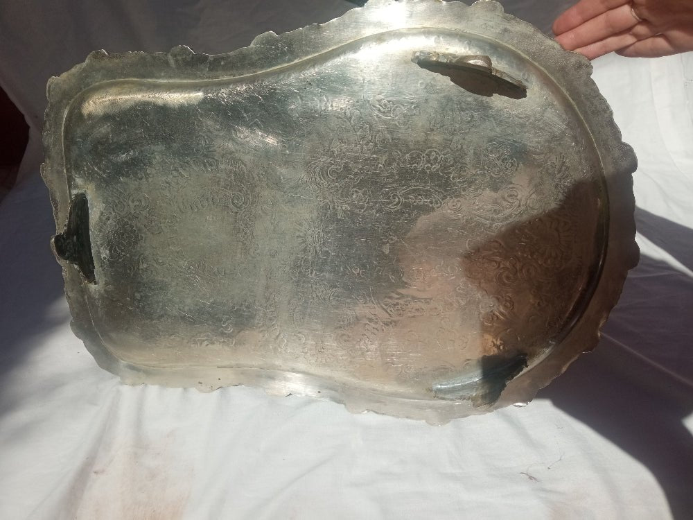 Clear glass container with visible wear on a white background