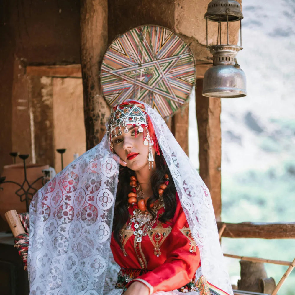 a young girl wearing berber jewelry 