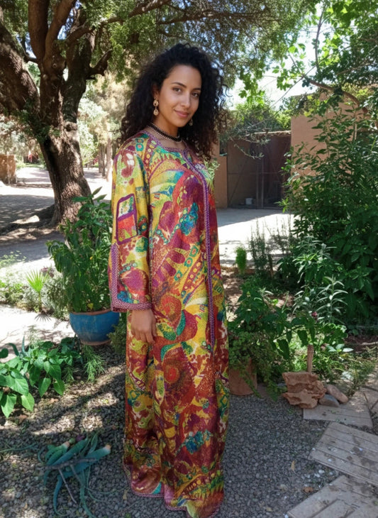 Moroccan Woman wearing vintage long colorful Moroccan kaftan 