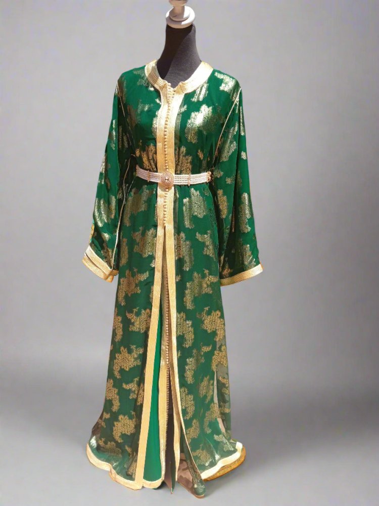 Green and gold dress on a mannequin 