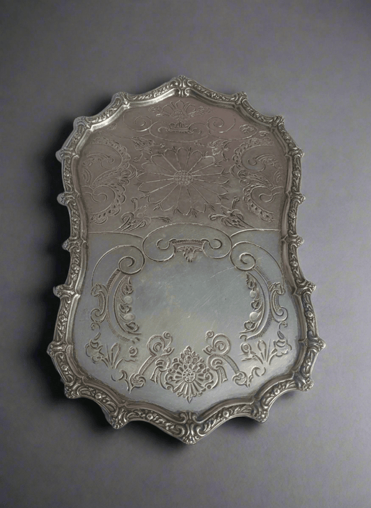 Decorative Moroccan vintage tray with intricate designs on a white background