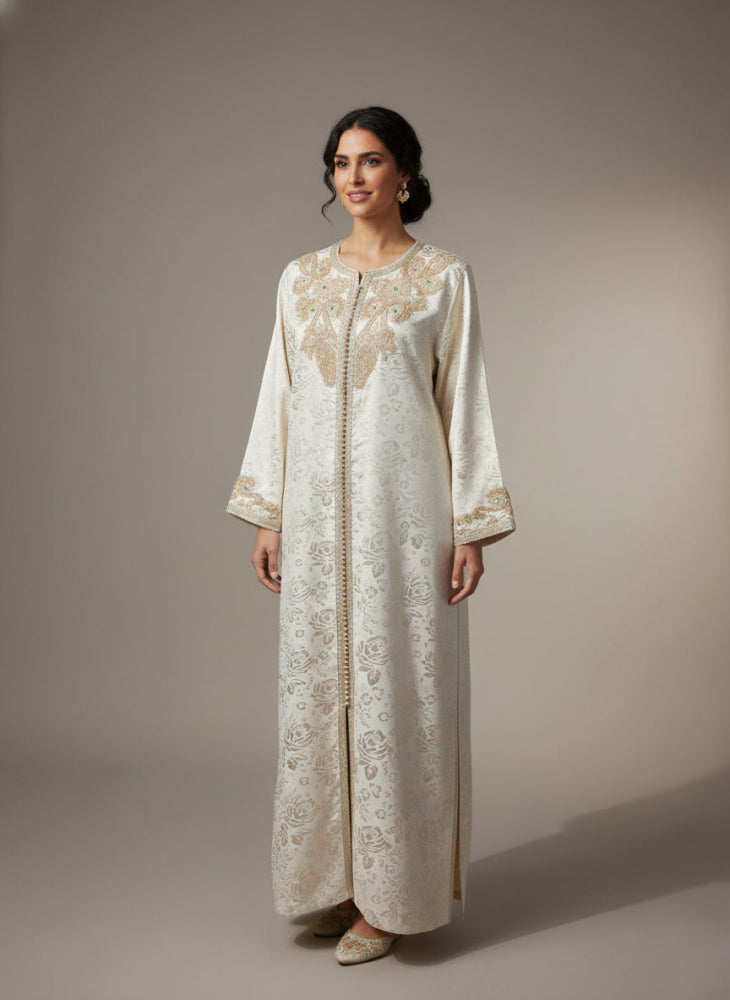 Woman wearing ivory metallic moroccan vintage kaftan beaded with embroidery 