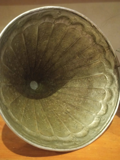 brass decorative con with intricate patterns from interieur